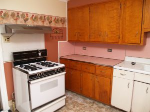 Worn Cabinets: When to Refinish and When to Paint