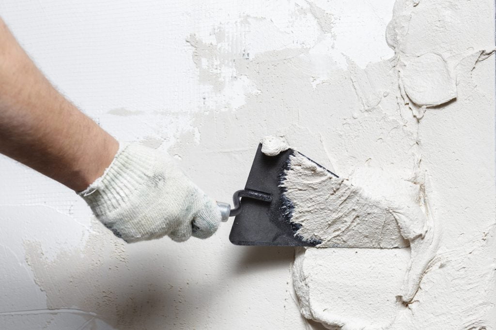 DIY Stucco Repair: Repairing and Sealing Cracks and Holes