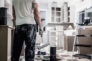 Man prepared for interior residential painting